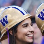 UW CM grad in hard hat
